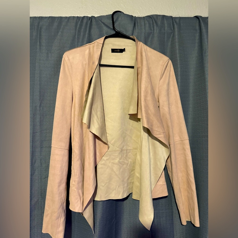 This is a soft pink cardigan. Worn for office job barely worn.